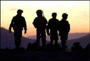 060510205557-ot1mfkpp0_us-soldiers-get-ready-for-a-patrol-as-the-sun-riseb.jpg